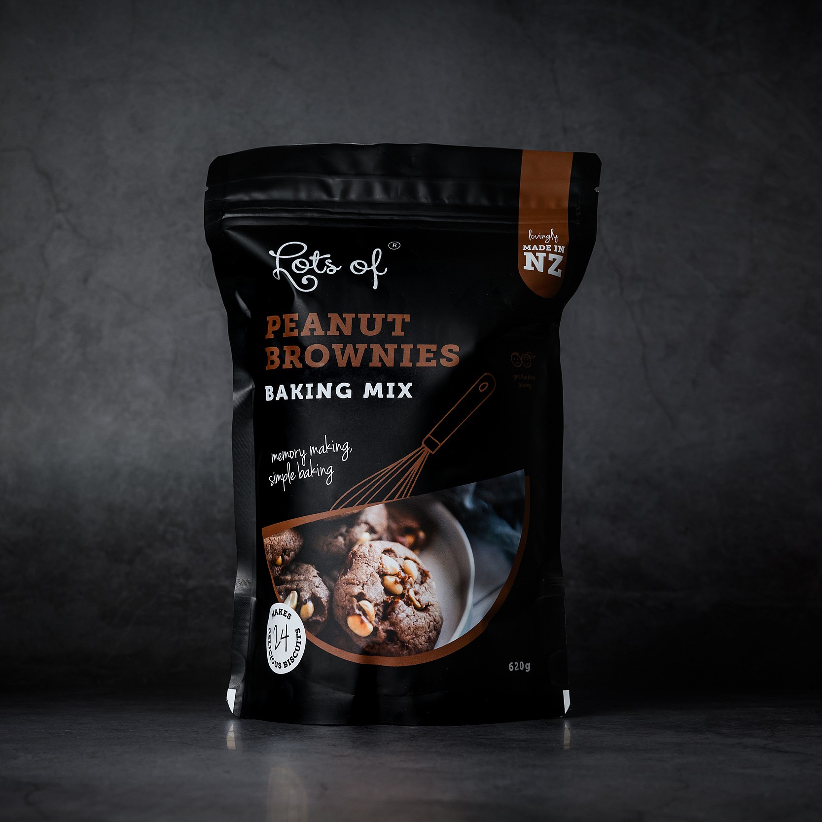 Peanut Brownies Baking Mix 5 Lots of Baking Mixes Peanut Brownies Baking Mix pouch on a dark background, New Zealand made chocolate peanut biscuit baking mix for easy homemade baking.